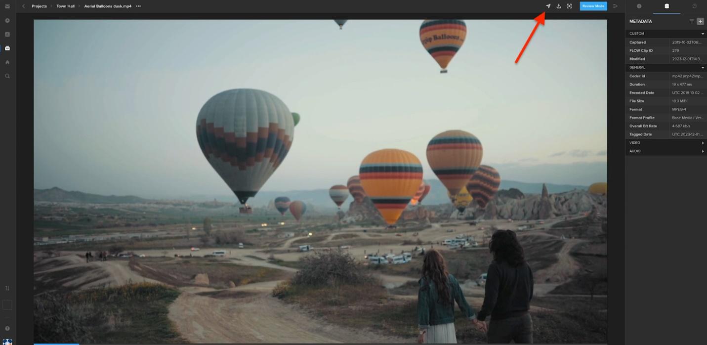 A group of hot air balloons in the sky

Description automatically generated